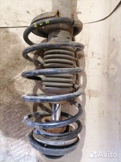 Стойка амортизатора переднего правого Citroen C3