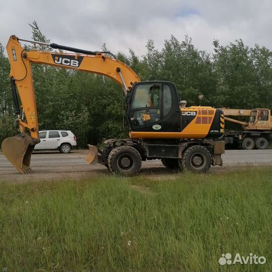 Услуги колёсного экскаватора