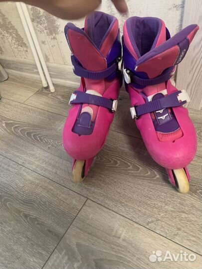 Роликовые коньки