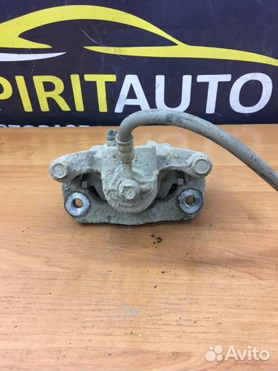 Суппорт тормозной задний левый Nissan Pathfinder 3