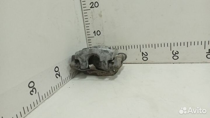 Суппорт тормозной задний левый Ford Focus