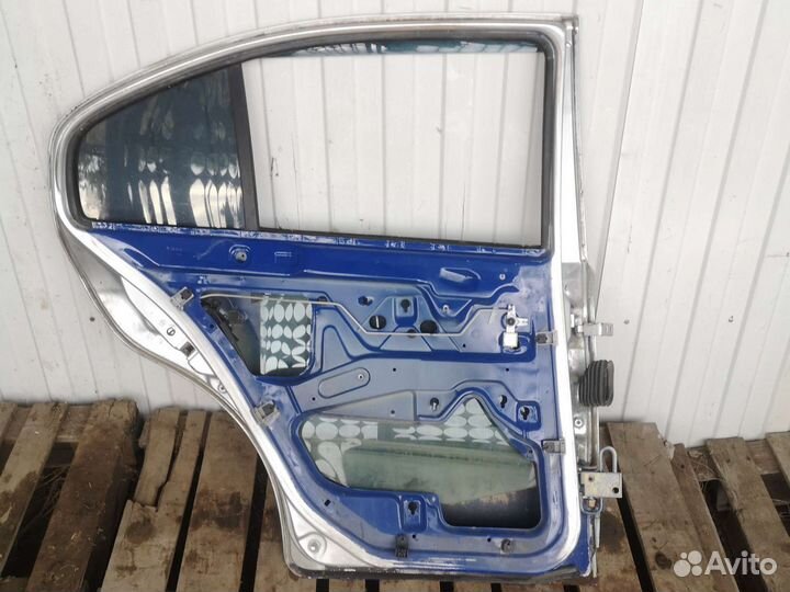 Дверь задняя левая Octavia tour лифтбэк