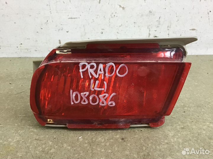 Фонарь задний в бампер левый Toyota Land Cruiser