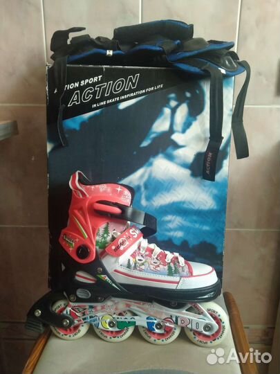 Роликовые коньки