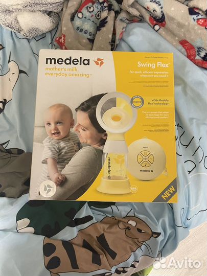 Молокоотсос medela swing электрический