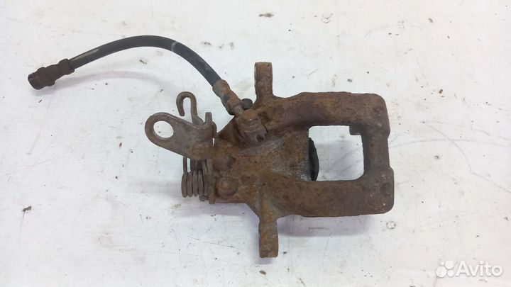 Суппорт задний левый Skoda Octavia A5