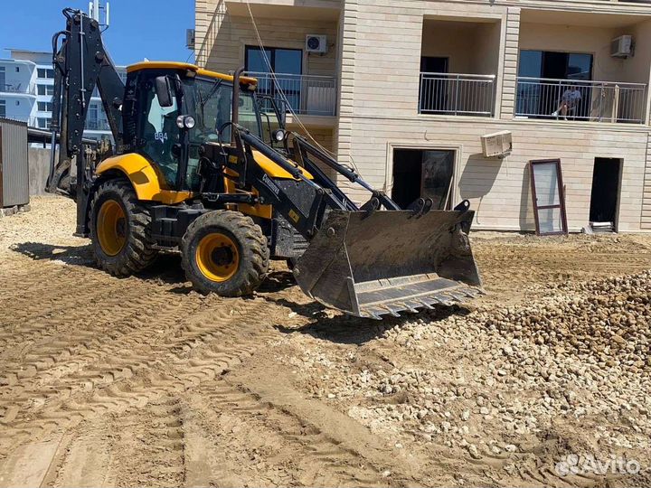 Услуги Экскаватора погрузчика (трактора)