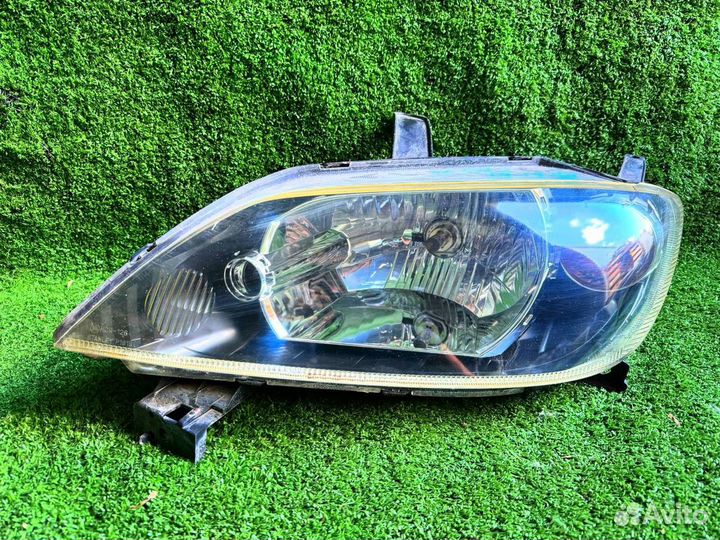 1074 фара на mazda demio DY3W