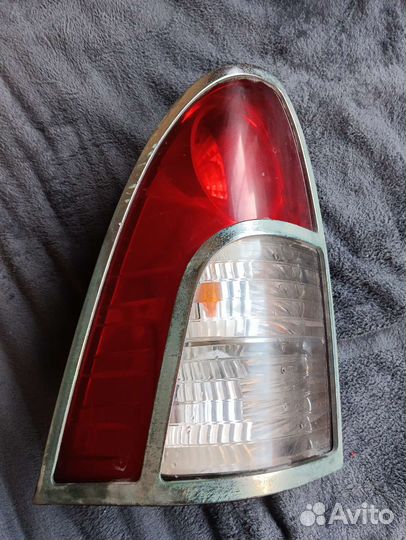 Фонарь задний Ссанг енг актион спорт