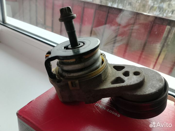 Натяжитель ремня генератора Opel Astra H