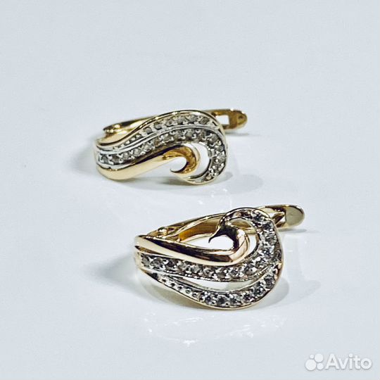 Золотые серьги с камнем