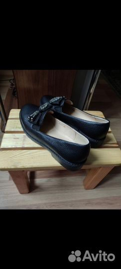 Новые черные туфли