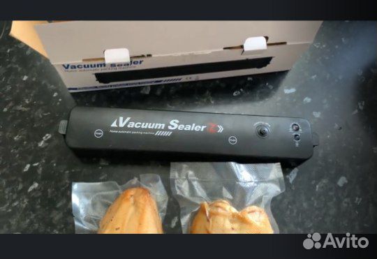 Вакуумный упаковщик