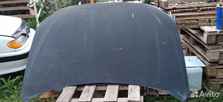 Капот новый Lancer 10
