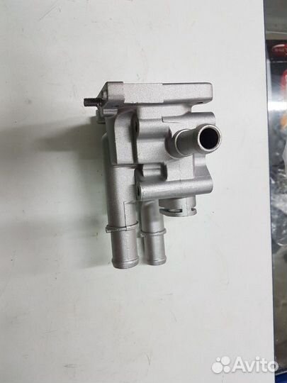 Корпус термостата Опель Астра 1.6-1.8