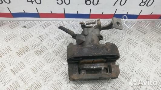 Суппорт тормозной задний правый toyota corolla E15