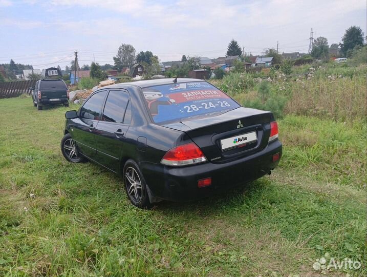 Mitsubishi Lancer 1.6 МТ, 2006, 244 000 км