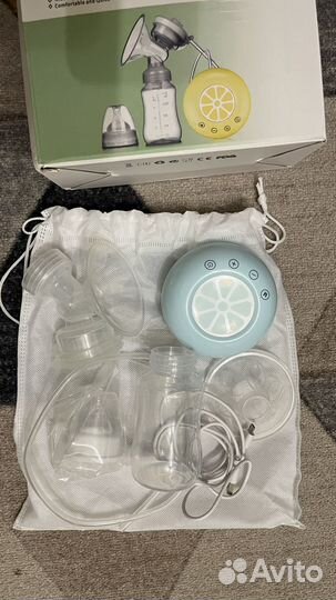 Молокоотсос электрический новый