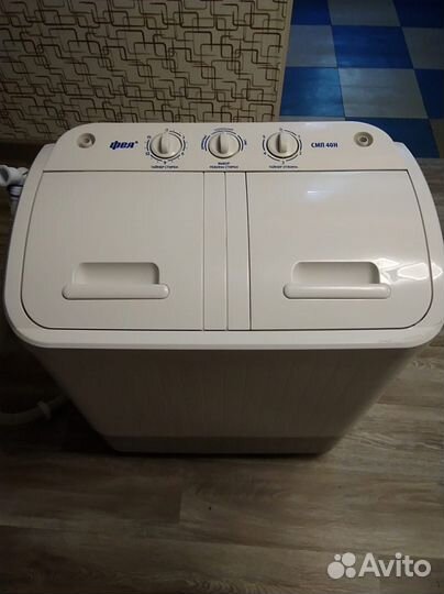 Стиральная машина вертикальной загрузки 