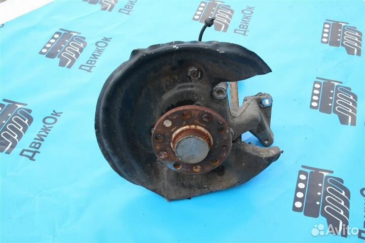 Кулак поворотный задний левый VW Passat B6