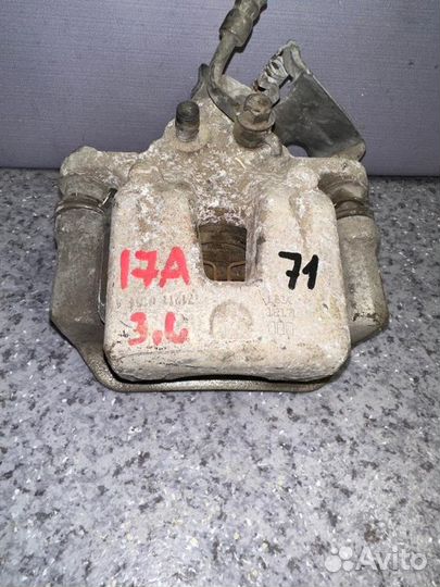 Суппорт задний левый Kia Cerato BD