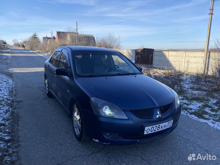 Линзованные фары Lancer 9