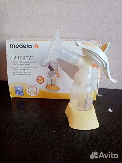 Молокоотсос medela ручной+вкладыши и бутылочка