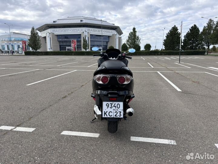 Макси скутер