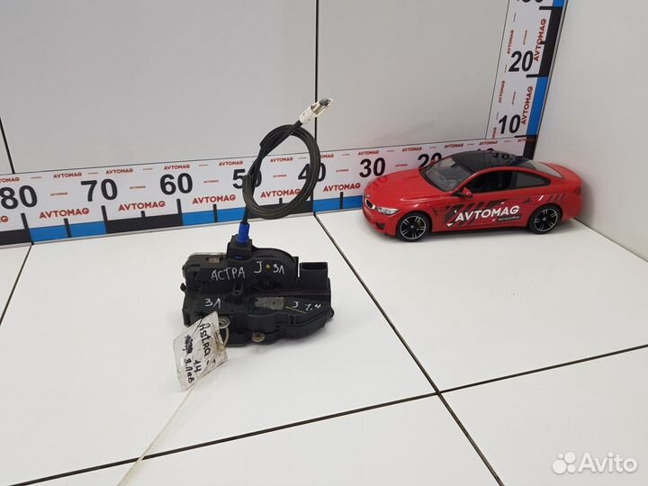 Замок двери задний левый (Opel Astra)