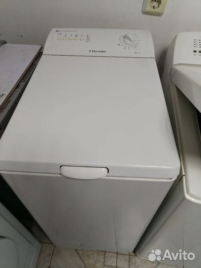 Electrolux с вертикальной загрузкой