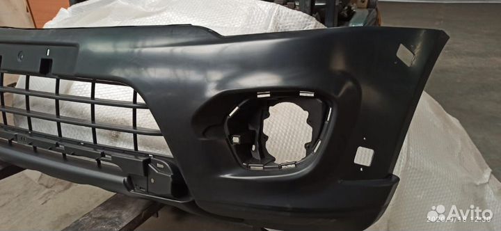 Бампер передний Mitsubishi L200 6400G111