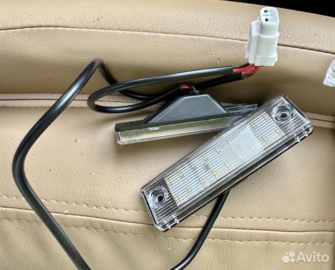 Подсветка номерного знака Toyota Prado