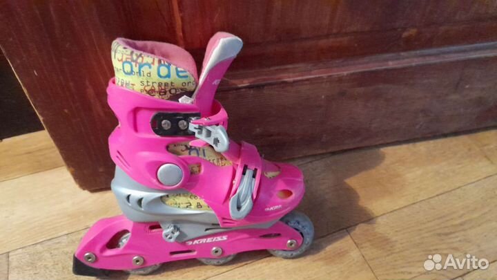 Роликовые коньки