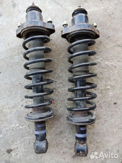 Стойки задние lancer 9