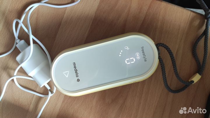 Молокоотсос medela freestyle flex + топ