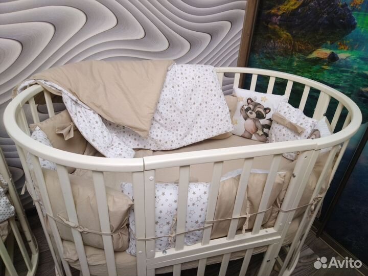 Детская кроватка с маятником