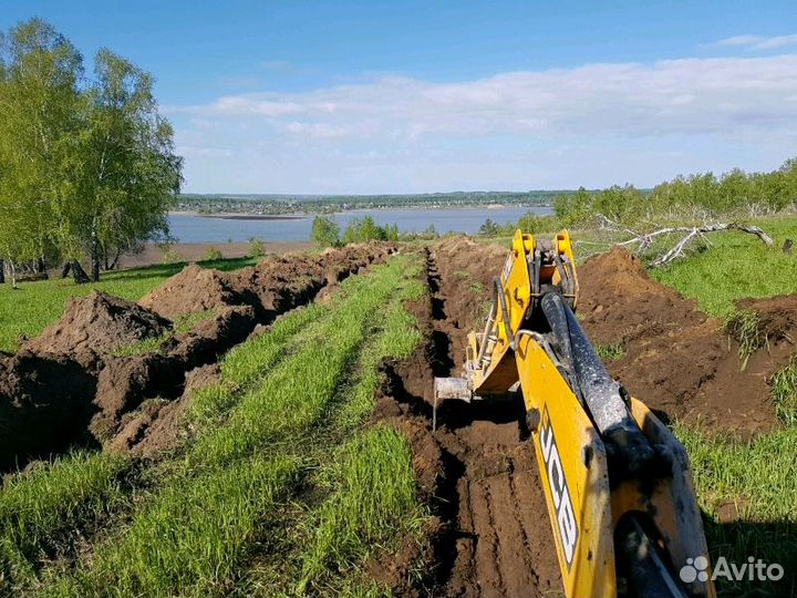 Экскаватор-погрузчик JCB, ямобур, буроям, снег