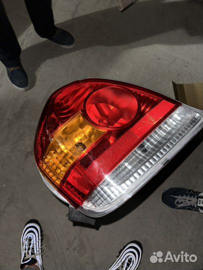 Фонарь задниц левый Toyota Echo
