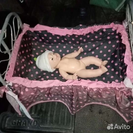 Куклы в люльке