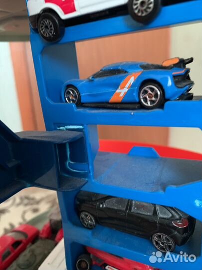 Hot wheels сити невообразимый гараж с тиранозавром