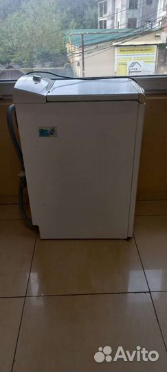 Стиральная машина с вертикальной загрузкой