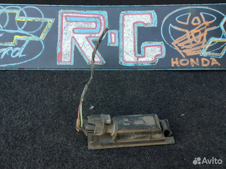 Фонарь подсветки номера Opel Astra H хэтчбек 1.6