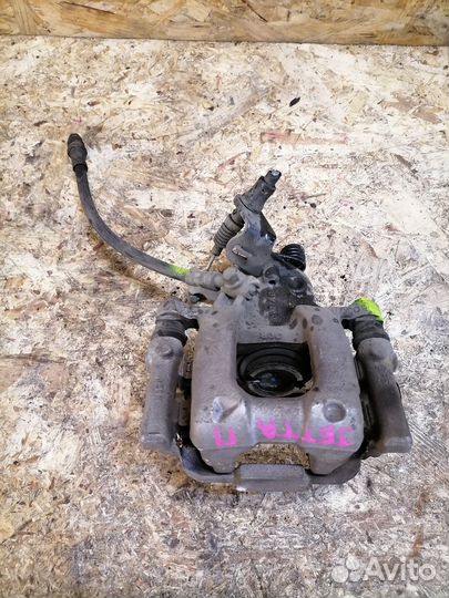 Суппорт задний правый Volkswagen Jetta 5