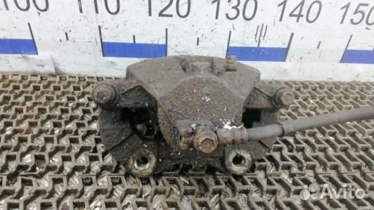 Суппорт тормозной передний правый nissan primera P