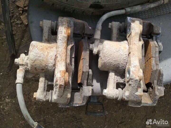 Суппорт тормозной передний левый Volkswagen Polo