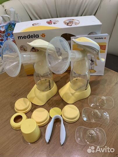 Молокоотсос medela ручной