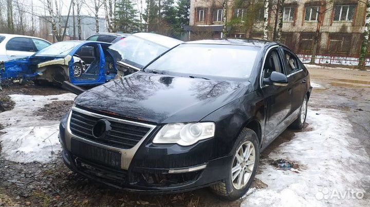Полуось передняя левая Volkswagen Passat B6