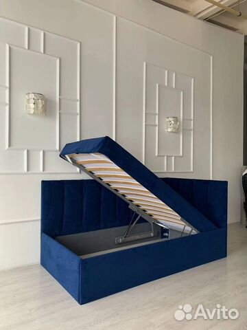 Кровать с подъемным механизмом