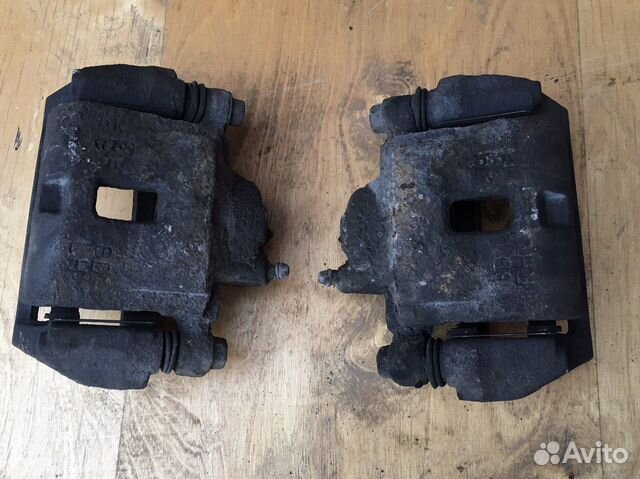 Суппорт тормозной передний Kia Spectra