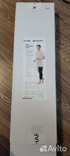 Коленный ортез тутор